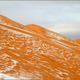 Illustration for article titled Photos of Freak Snowfall in the Sahara Look Unrealem/em